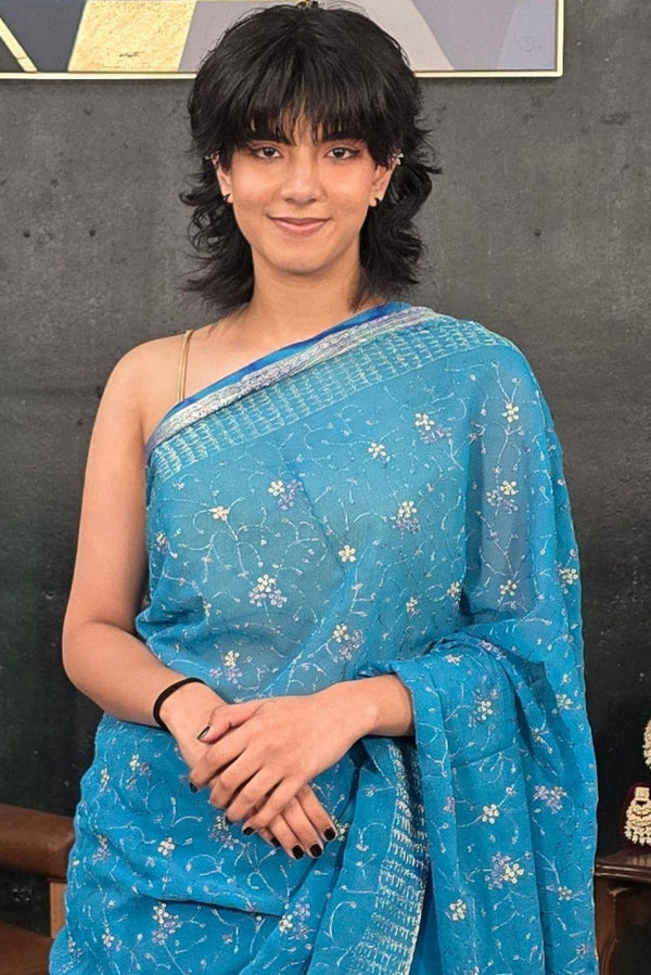 Pure Georgette hand embroidered Blue Saree