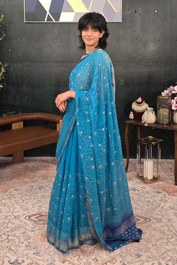 Pure Georgette hand embroidered Blue Saree