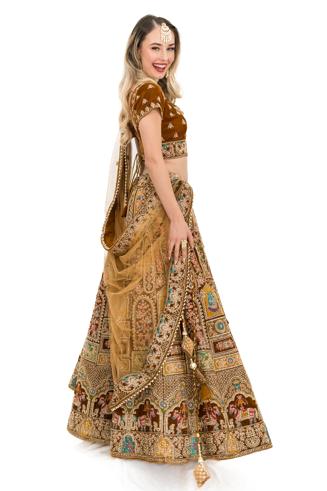 Gold heavy embellished lehenga