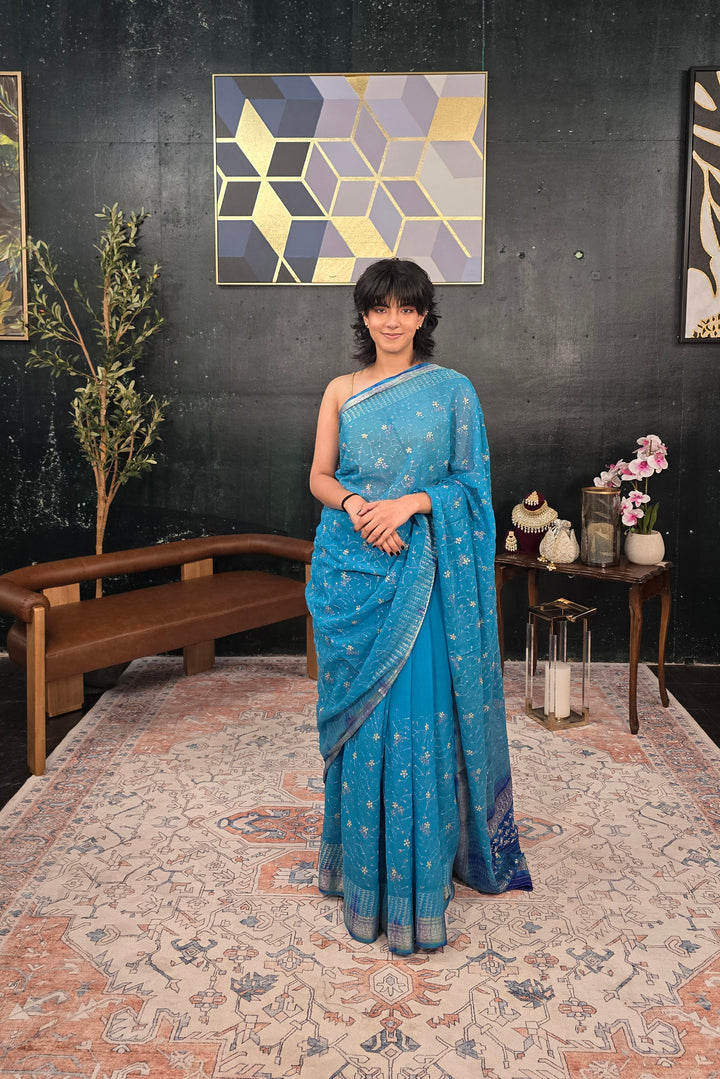 Pure Georgette hand embroidered Blue Saree