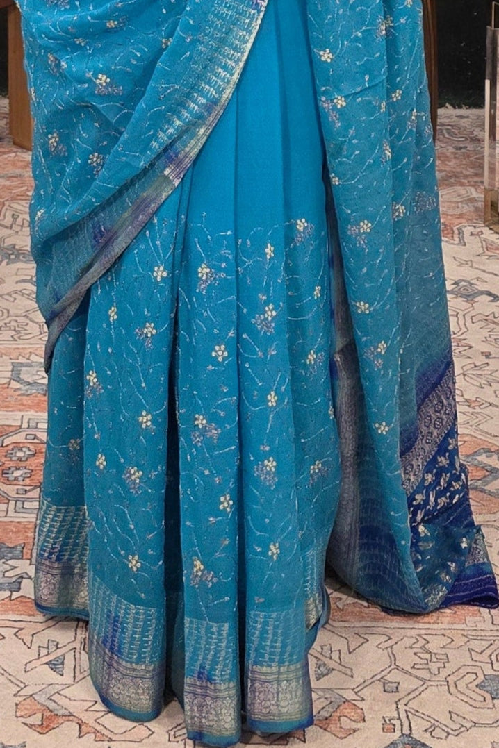 Pure Georgette hand embroidered Blue Saree