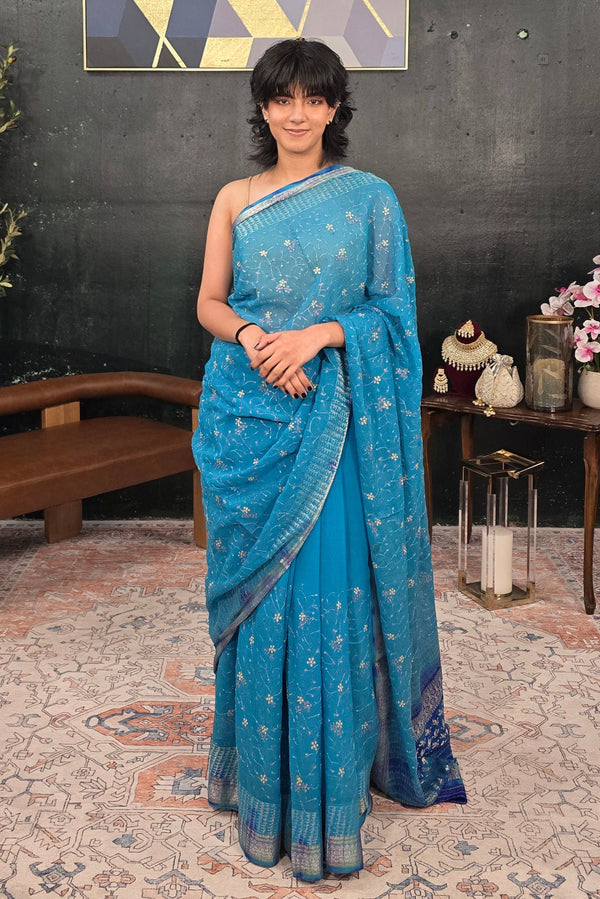 Pure Georgette hand embroidered Blue Saree