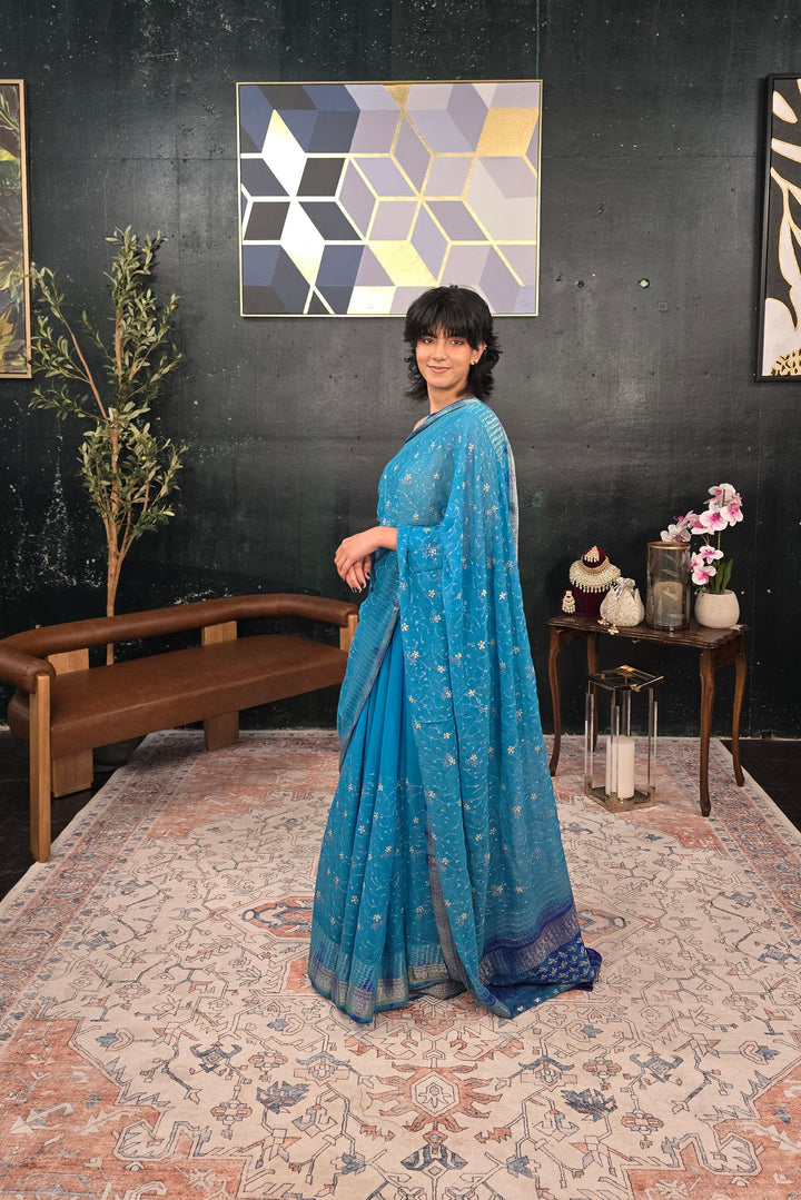 Pure Georgette hand embroidered Blue Saree