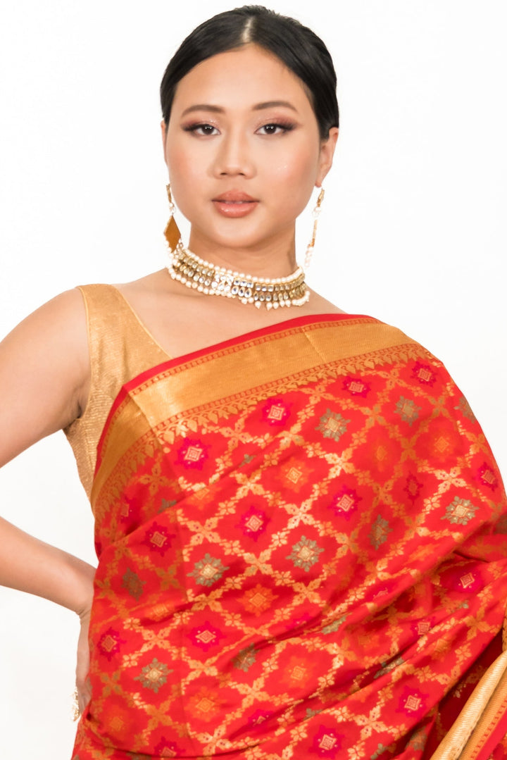 Rust red woven Banarasi Saree