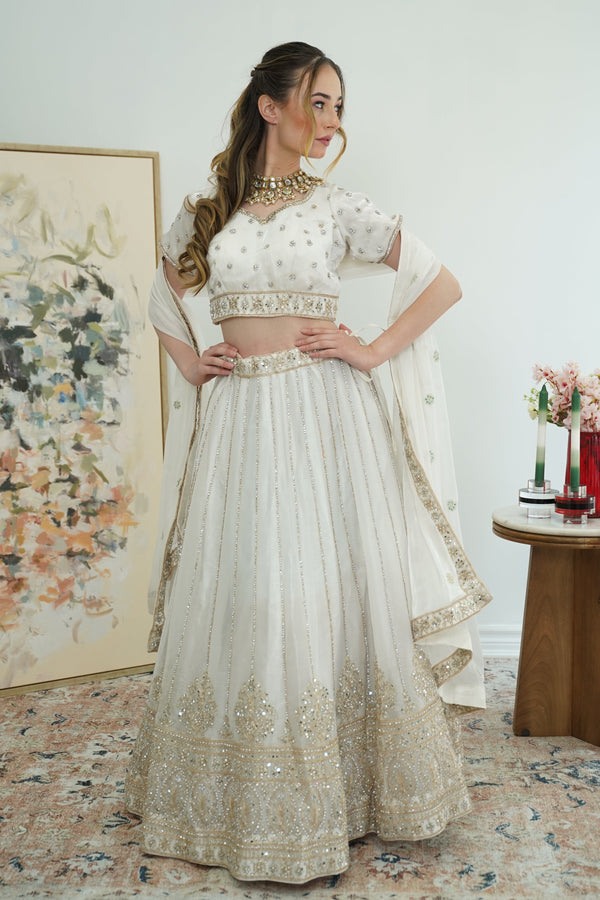 Pristine white gold work Lehenga