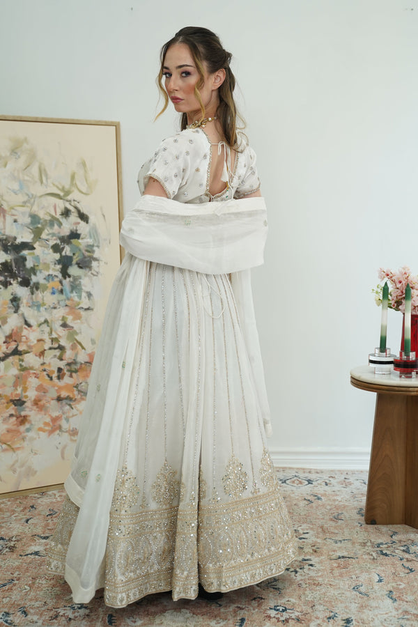 Pristine white gold work Lehenga