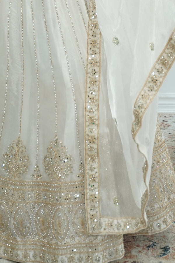 Pristine white gold work Lehenga
