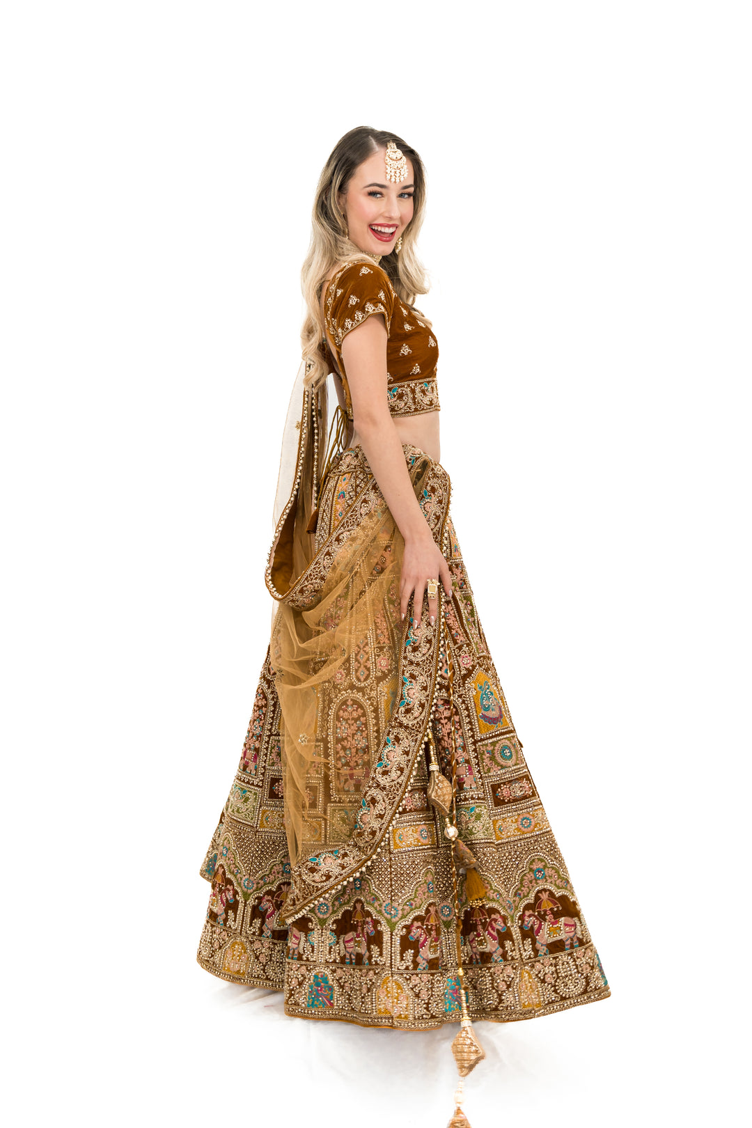 Gold heavy embellished lehenga