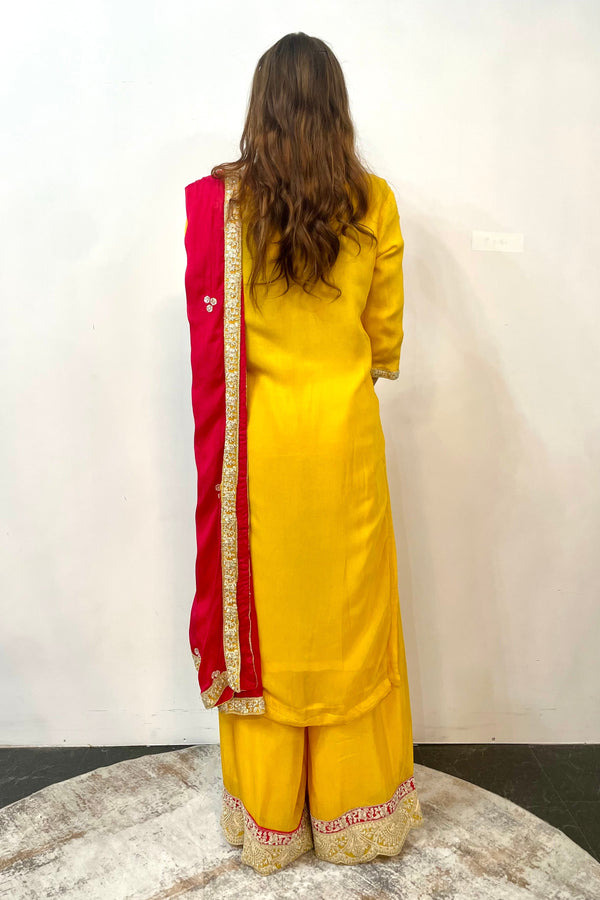 Sunshine Yellow Salwar Kameez with Red Zari Yoke