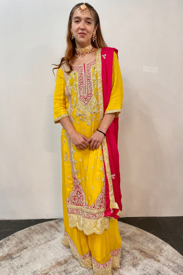Sunshine Yellow Salwar Kameez with Red Zari Yoke