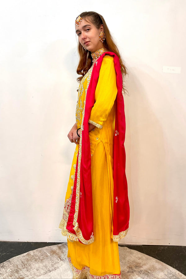 Sunshine Yellow Salwar Kameez with Red Zari Yoke