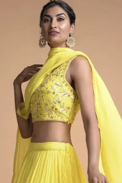 Lemon Yellow Tiered Lehenga with Embroidered Sleeveless Choli