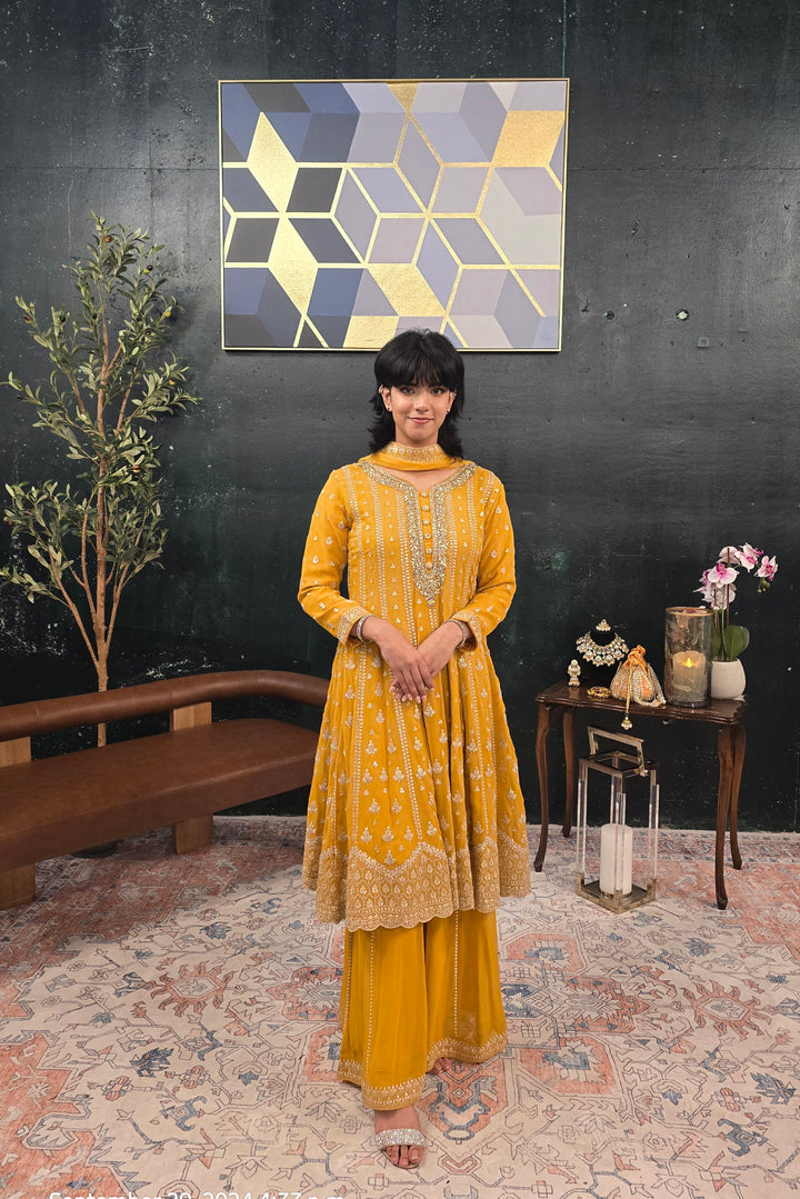 Yellow georgette crystal work Salwar Kameez